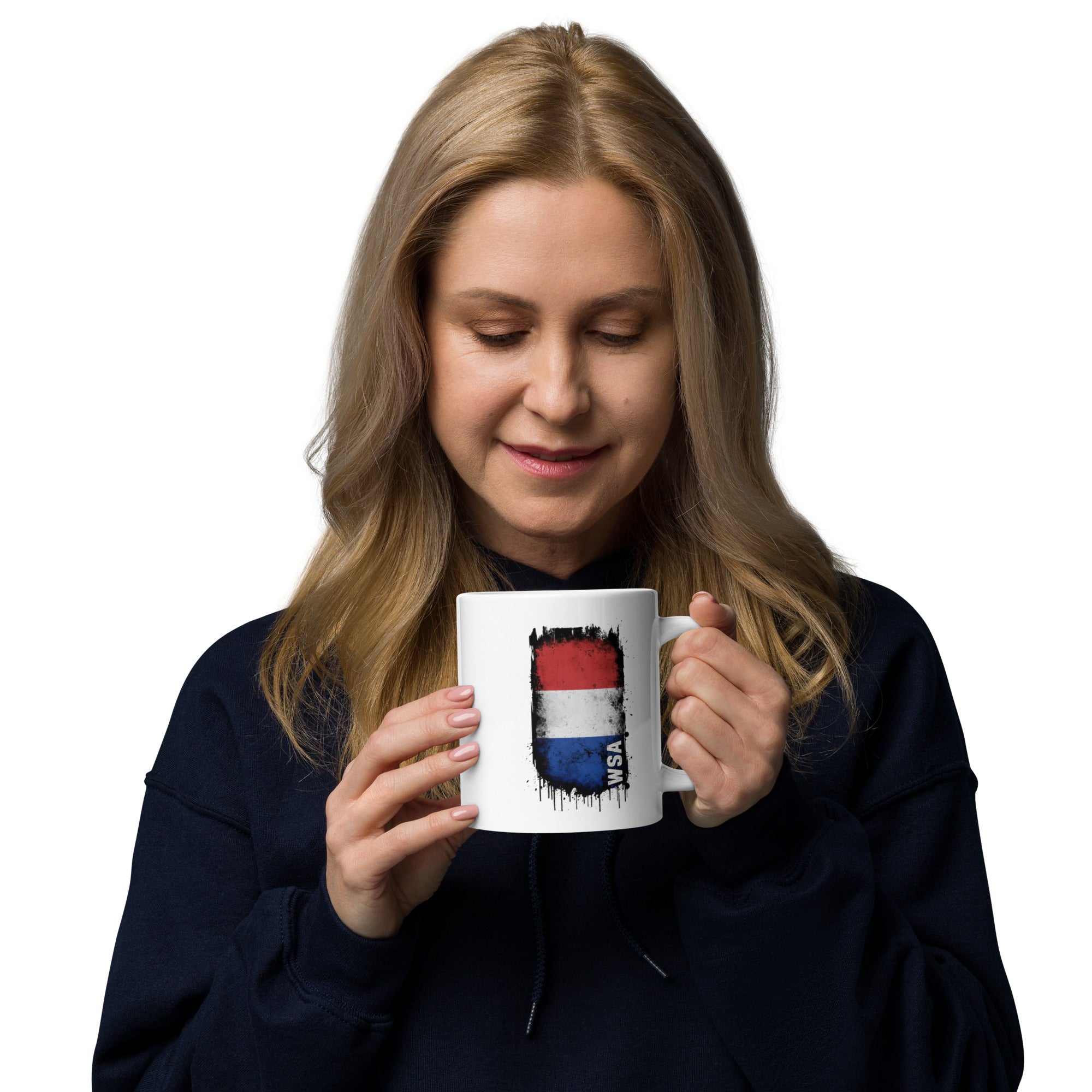 Woman holding a mug with a colorful design on a white background