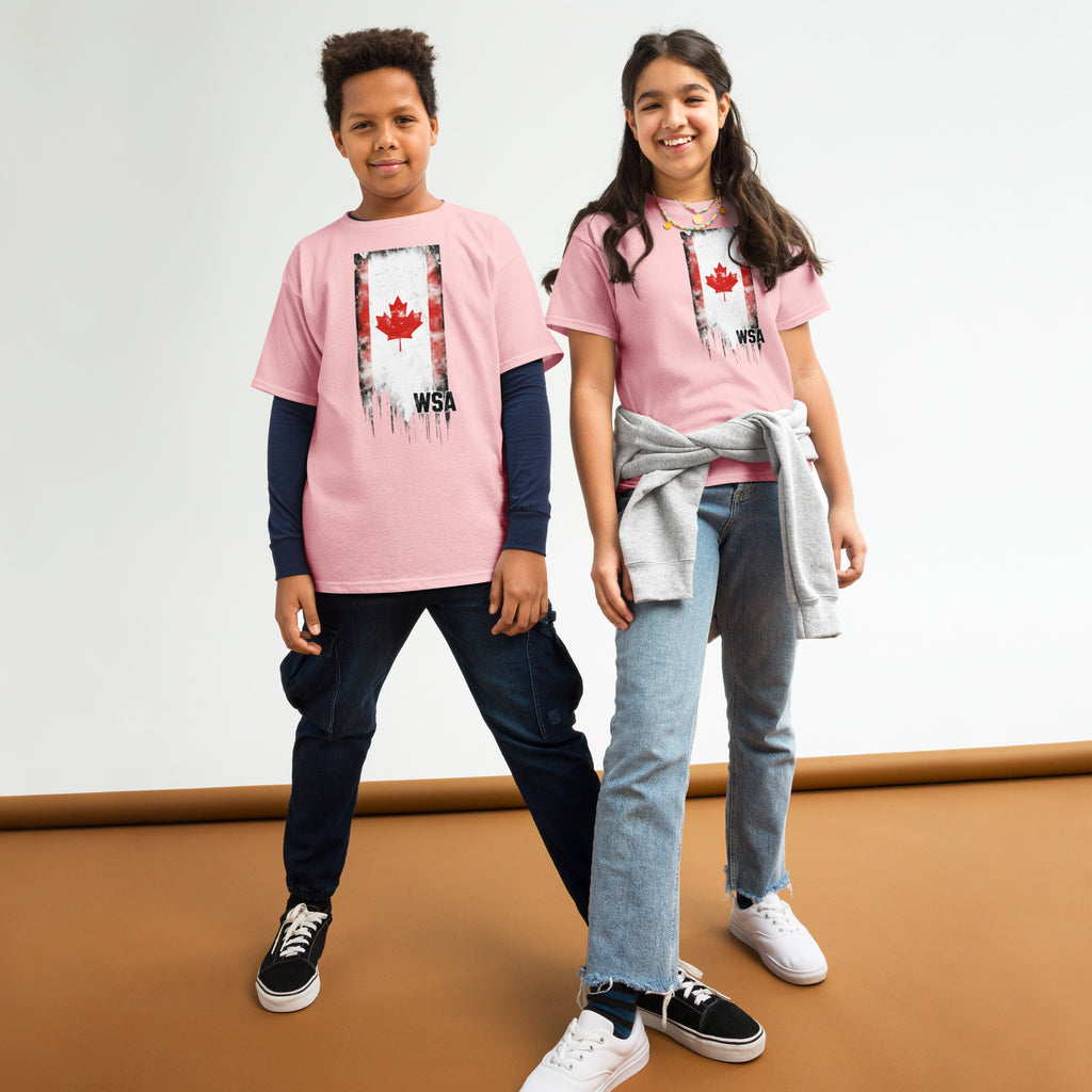 Two children wearing pink 'Happy last day of school!' t-shirts on a plain background.
